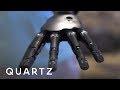 Living with a mind-controlled robot arm