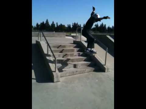Skateboard ollie off 6 stairs
