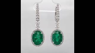 Emerald and diamond halo drop earrings