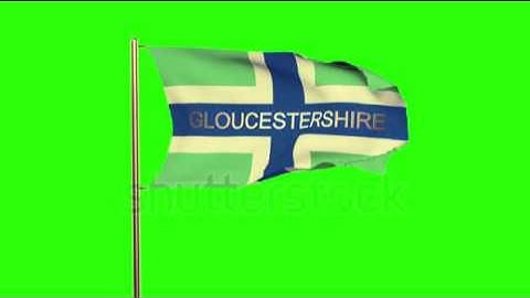 Gloucestershire flag with title waving in the wind. Looping sun rises style. Animation loop Stock