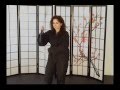 Sexy Woman Using Martial Arts Nunchaku