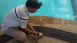Swimming Pool Overflow Drain Gratings Cutting Work For Proper Alignment