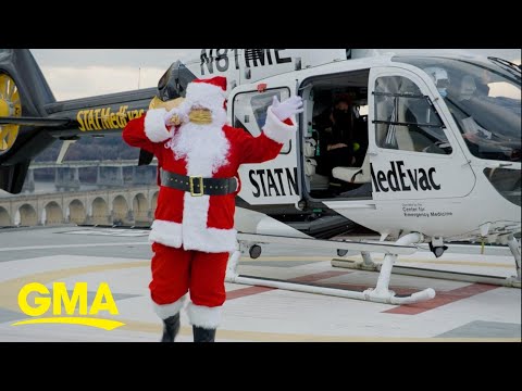 Santa ditches reindeer for helicopter to visit pediatric patients