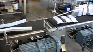 Conveyor belt with product rotation device  PRL Tecnosoft