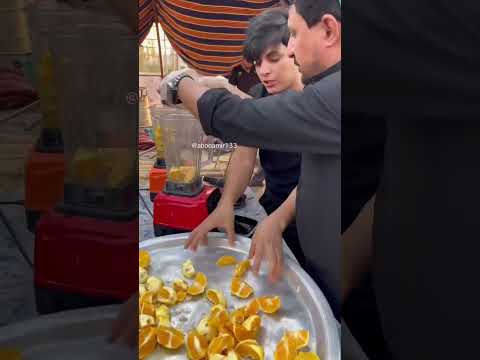 عمل عصير البرتقال الطبيعي الزوائر الامام الحسين ع ماجورين ان شاء لله شباب السلام على الحسين