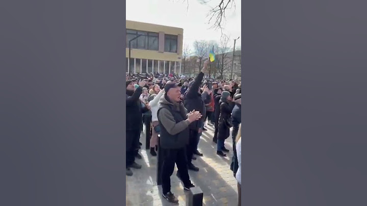 Война России с Украиной: захваченная РФ Каховка, митинг за Украину.