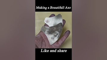 "Forging Legends: Crafting a War Axe from Rusted Iron Gear"