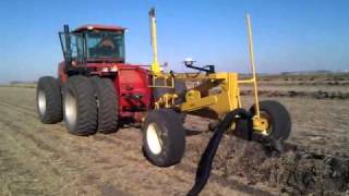 2010 Tiling, Intellislope with a pull type Johnson plow