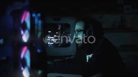Hooded Hacker Trying to Break into Government Data Servers | Stock Footage - Envato elements