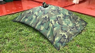 The Alpha Tent Poncho in heavy rain