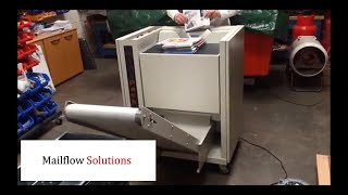 Minipack Torre polybagger with delivery conveyor