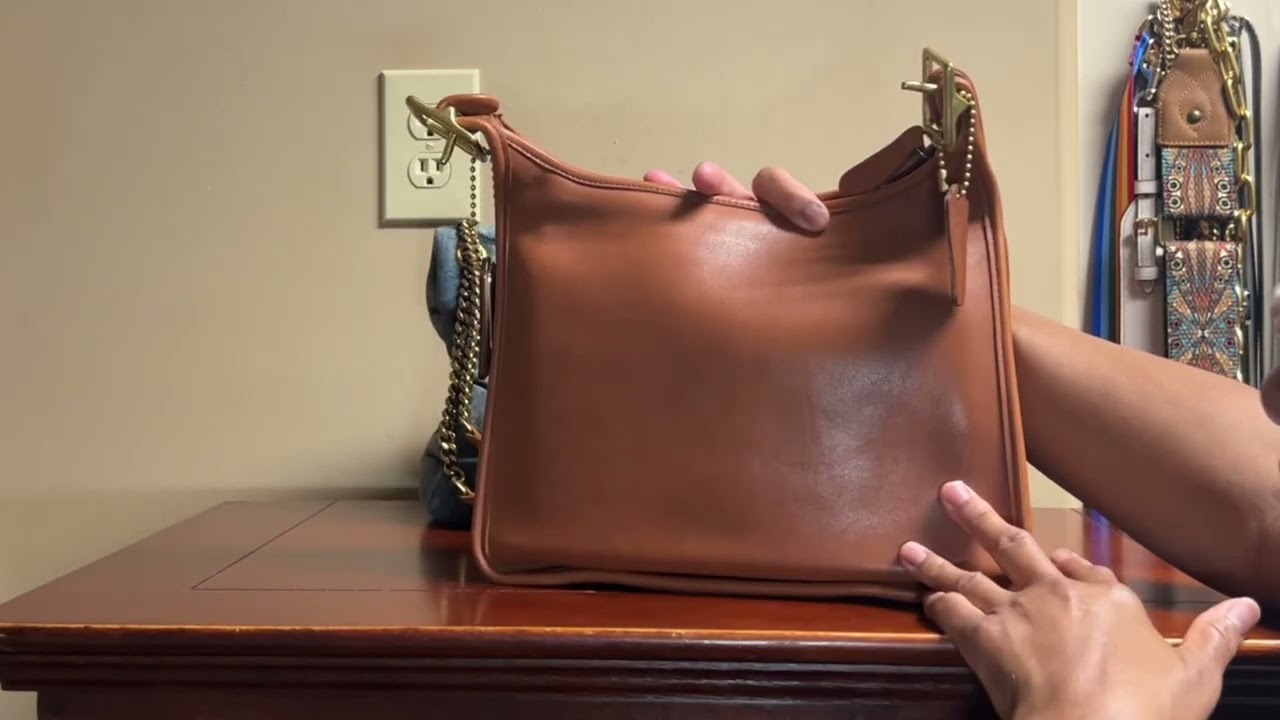 Coach Rambler! I had this bag for 3 years and it's aging extremely well. Coach  leather definitely serves! : r/handbags