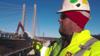 Rolling a 827ft bridge off over a river in 40 weather. MUST WATCH!