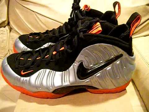 silver and orange foamposites