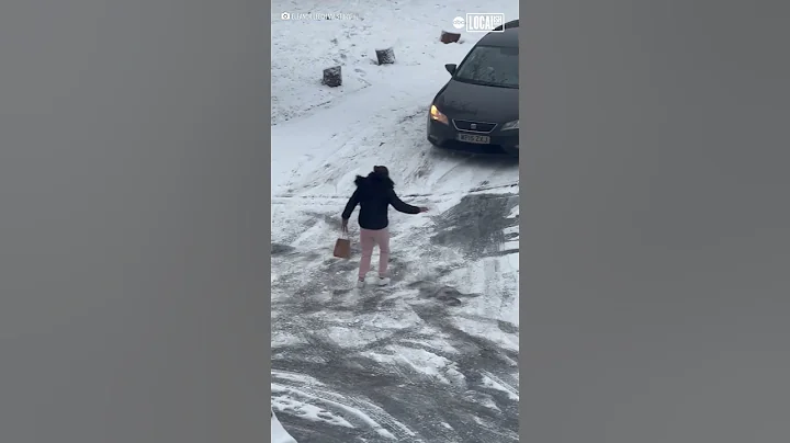 Woman hilariously slips on icy road