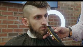 MC Barber Crafting Tailored Haircuts with Expert Precision!