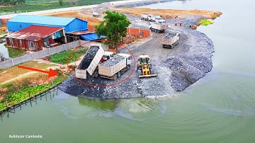 THE MACHINERY TEAM WORKED VERY WELL USE POWER WHEEL LOADER PUSH THE  ROCK INTO THE DEEP WATER