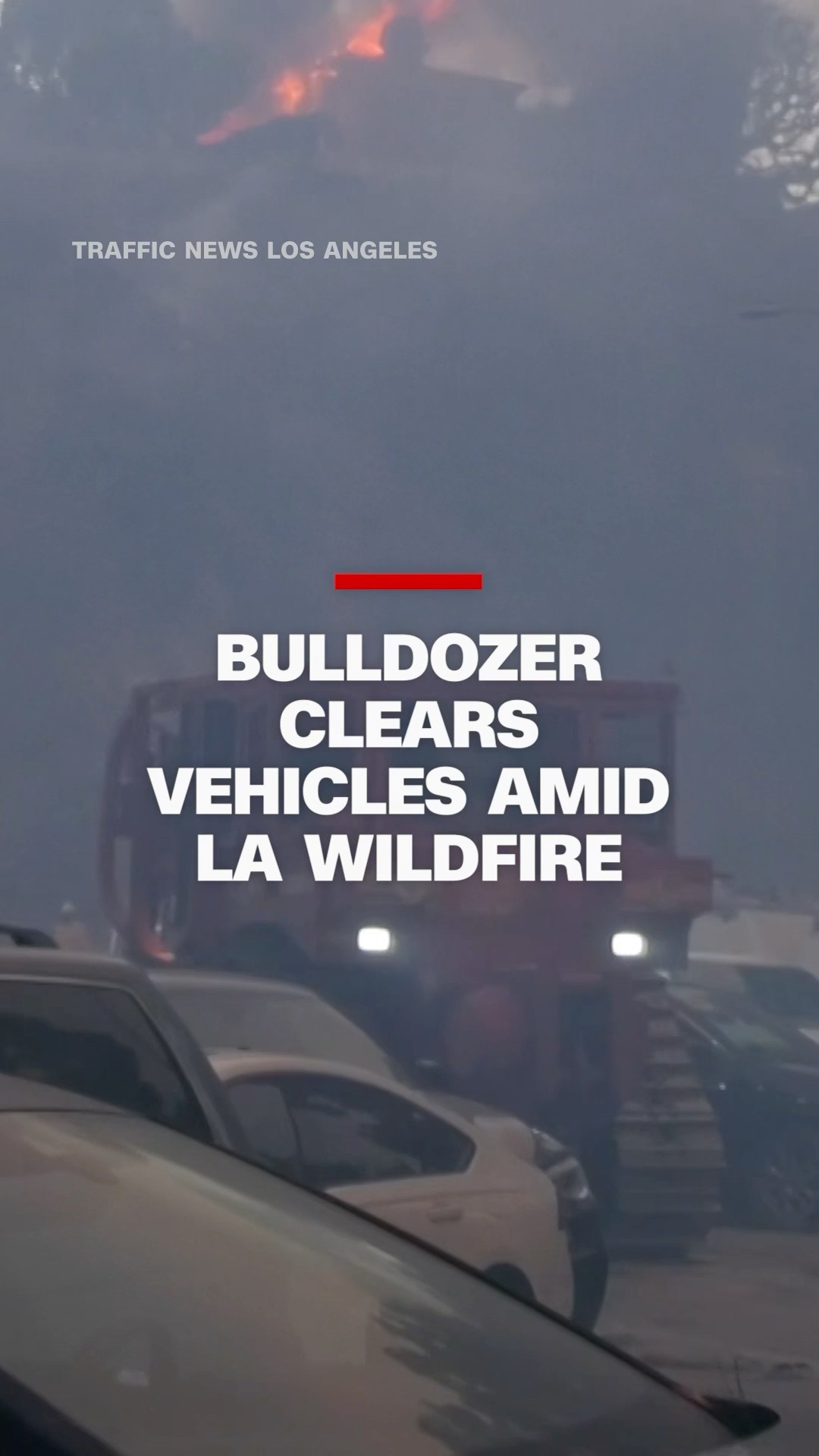Bulldozer clears vehicles amid LA wildfire