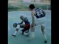 Bill Boggs tries to go one-on-one w/ Curly Neal of Harlem Globetrotters