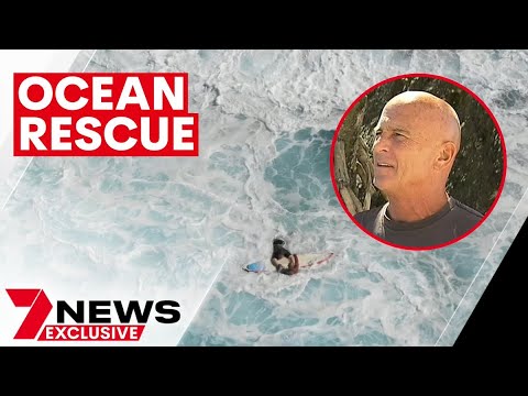 Swimmer saved by surfer in incredible rescue at Fingal Head, New South Wales | 7NEWS