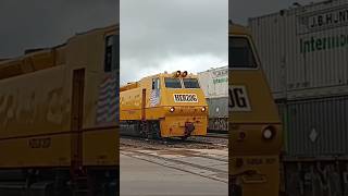 HZGX 207 leads a westbound ballast train in the siding in Augusta next to a westbound intermodal!!!!