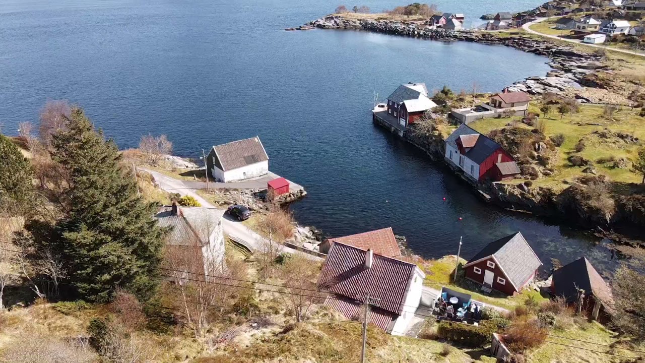 Aerial Drone Flight over Husevåg Village on Husevågøy, Norway - 2021