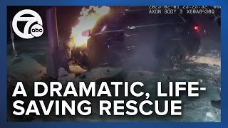 Police save suspect from burning vehicle after chase