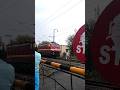 Express train crossing level crossing gate in uniform speed 🚂 #railway #express #train #ytshorts