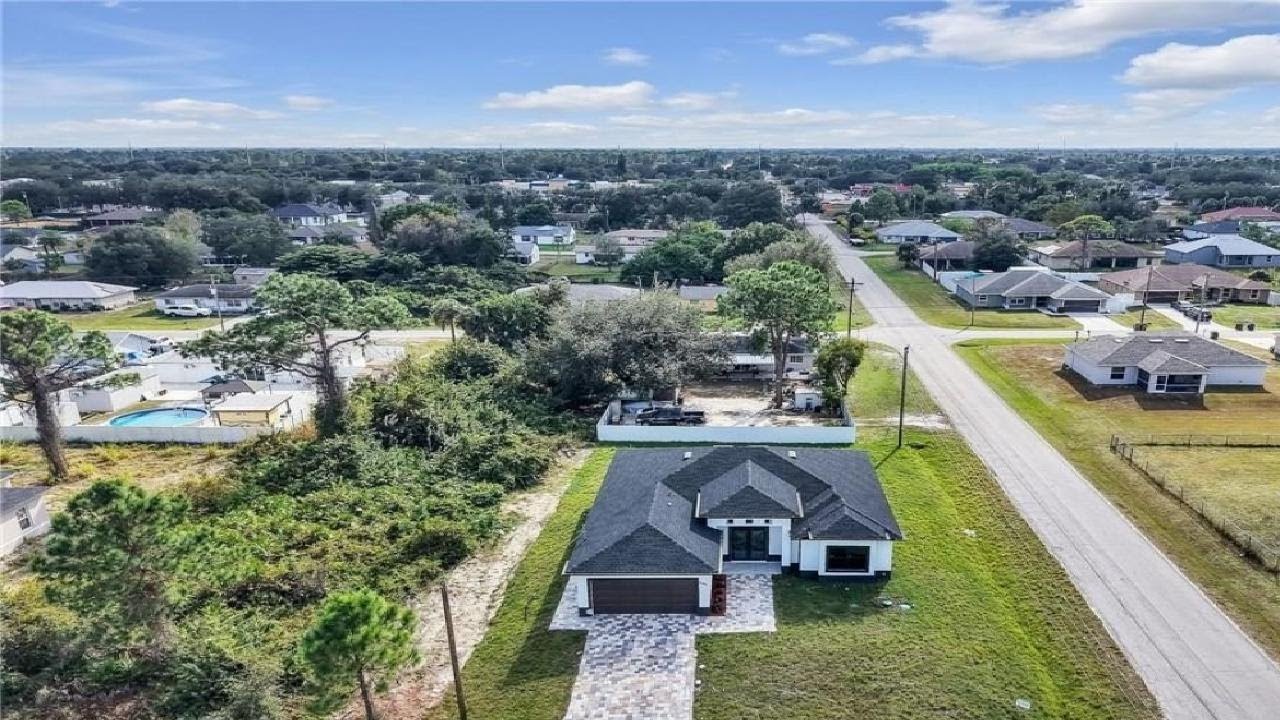 Brand New Dream Home in Lehigh Acres | Corner Lot New Construction | 3+Den