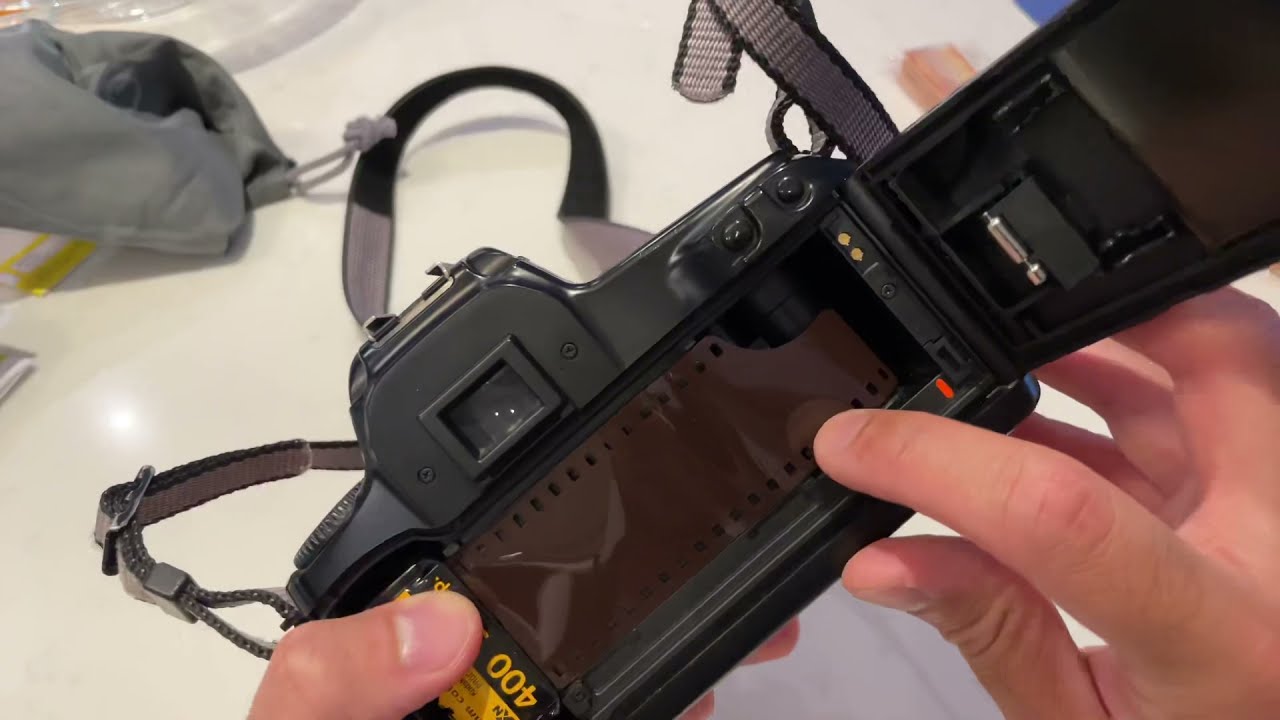 Changing camera film on the Canon EOS 1000F Rebel for the first time!