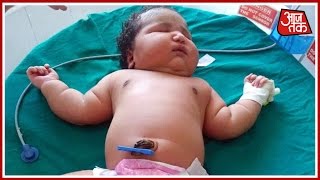 A mother has given birth to the world's biggest baby girl - who weighs
same as an average six-month-old. unnamed was born by caesarean
section o...