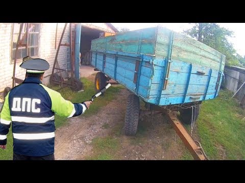 "Профессиональная Езда на Тракторе  задним ходом с прицепом и поворотной передней осью без стопора."
