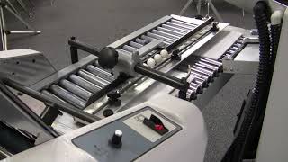 Baum 714 tabletop folder with 8 page