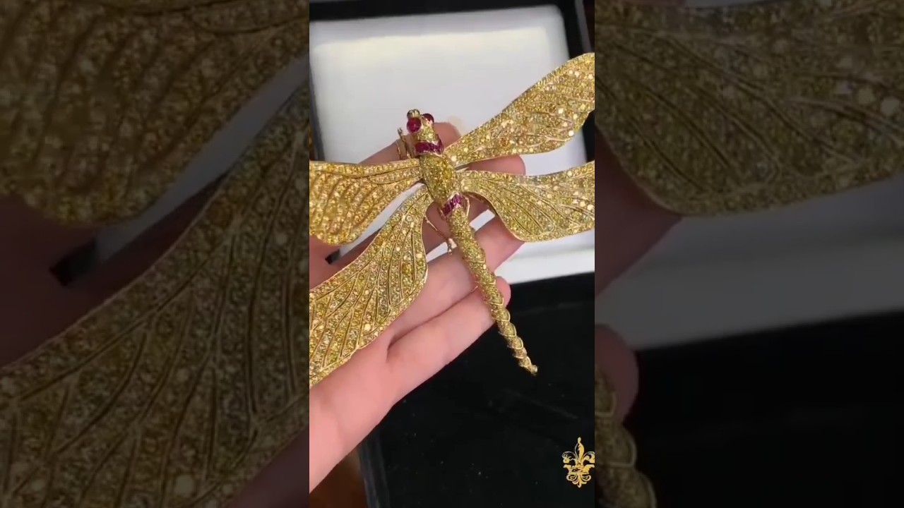 Over 60 carats of yellow diamond glitter on this dragonfly brooch punctuated by rubies. Credit:MSRau