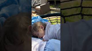 Guy Rocking Kids to Sleep on a Swing