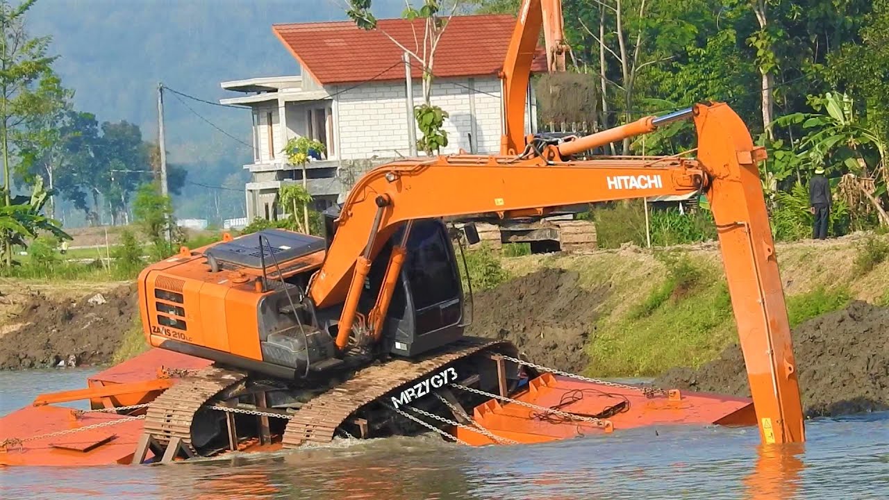 Long Reach Excavator Digging Mud Sedimentation From The River Hitachi ...