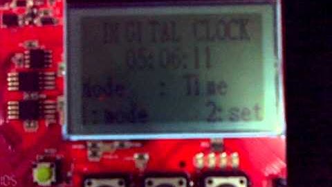 Implementasi Jam Digital pada board Nuvoton LB NUC 140 - Kelompok 18