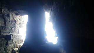 Smugglers Cave with inscribed name from 1904 in Northumberland