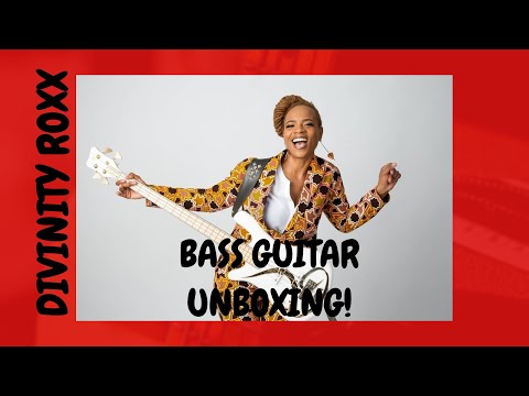 female-bass-player-divinity-roxx-unboxing-new-birthday-bass-guitar!