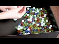 160 стеклянных шариков марблс