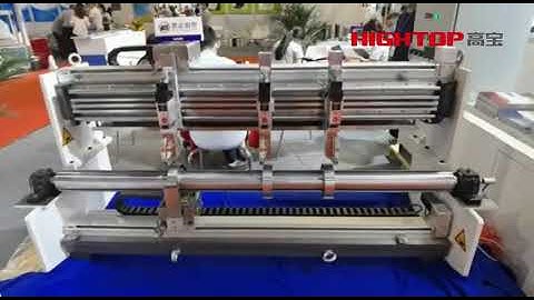 Full automatic adjustment of blade position for slitter rewinder
