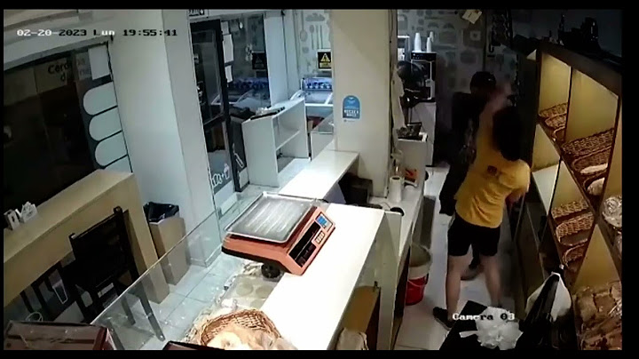 Woman defends herself with knife against armed robber