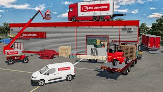 Entrepôt Frans Bonhomme plein de camions et de semi-remorque (Cariste déchargement des marchandises)