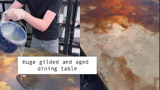 huge gilded and aged dining table