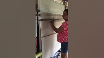 Making a Hammock by hand, on a vertical loom, by an artisan woman, in the town of San Jacinto.