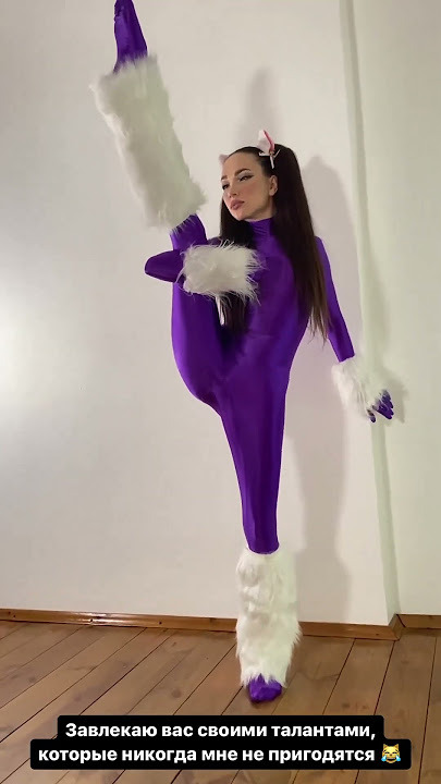 Beautiful Model Etoshanty in shiny purple lycra unitard Part 4.