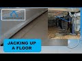 Jacking up a sagging floor
