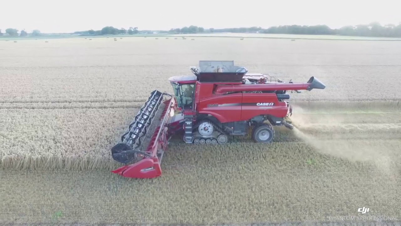 8240 with 35ft header Axial Flow Combine - YouTube
