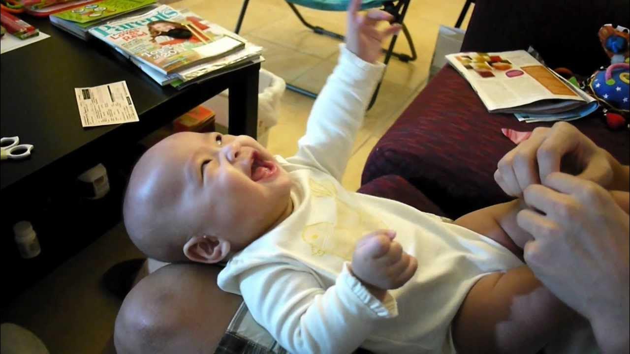 baby Audrey laughing at ripping paper YouTube