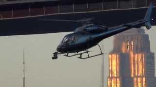Helicopter under the Brooklyn bridge